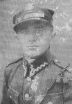 Zdjęcie Jana Kurenia z odbywanej zasadniczej służby wojskowej lub ćwiczeń wojskowych z 1933 r. (rok podany na odwrocie zdjęcia).